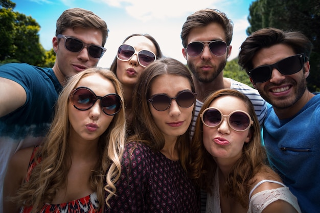 Happy friends posing for a selfie