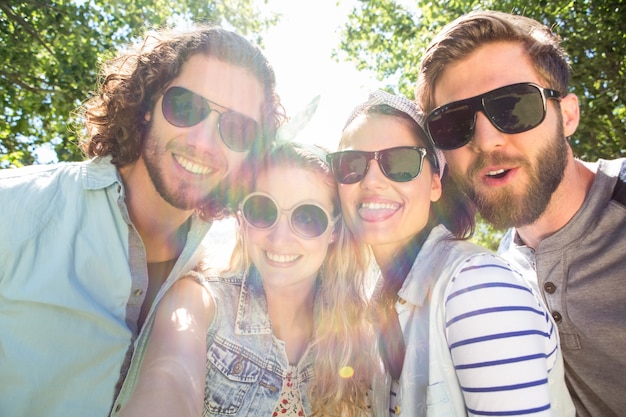 Happy friends taking a selfie