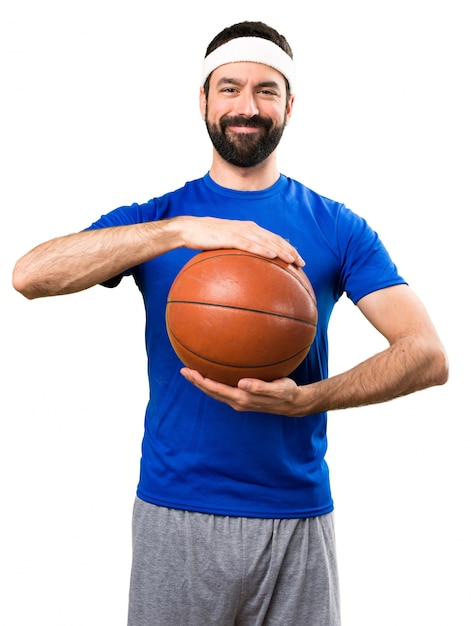 Photo happy funny sportsman with ball of basketball on isolated white background