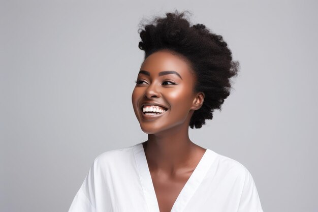 Happy Ghanaian lady with beautiful skin and normal hair wearing all white plain background