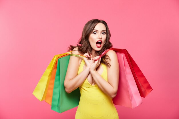 Happy girl doing shopping