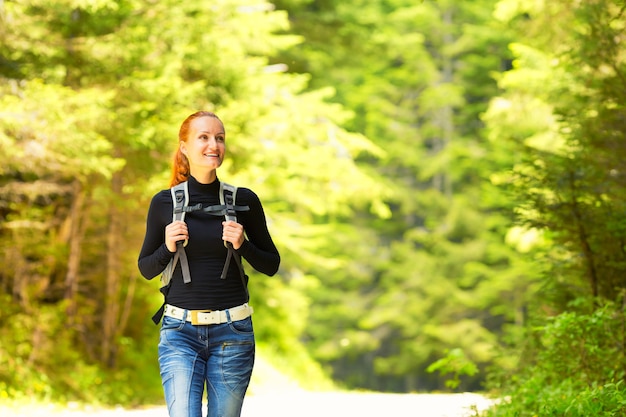 Happy girl in the forest