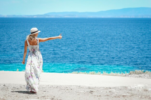 A Happy girl near the seashore in nature weekend travel