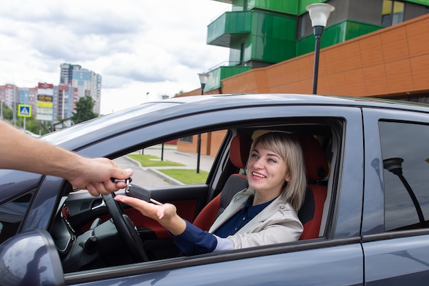 The Happy girl rented a car