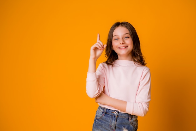 Happy girl smiling with a raised finger