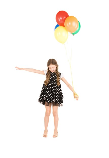 happy girl with colorful balloons over white