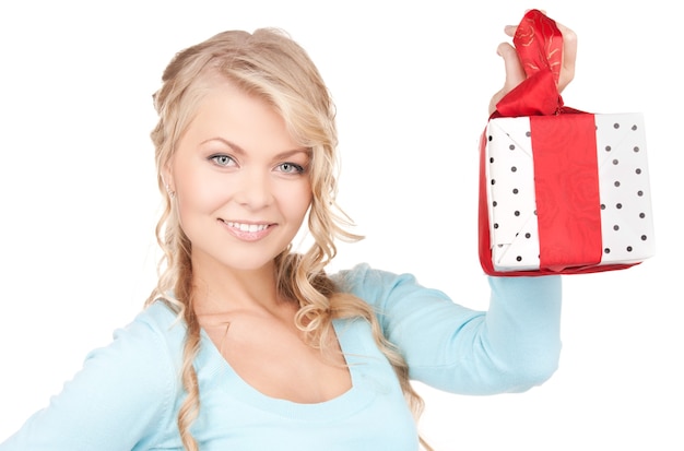 Photo happy girl with gift box over white