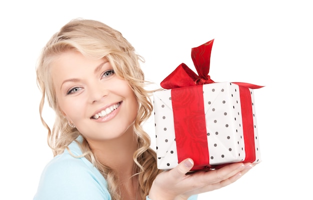 happy girl with gift box over white