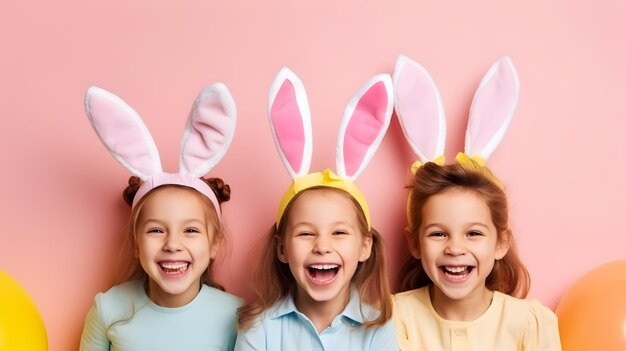 Happy girls in bunny ears celebrating easter