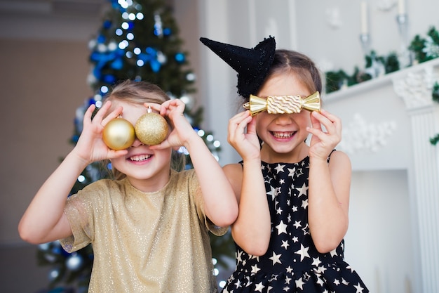 happy girls having fun on christmas time