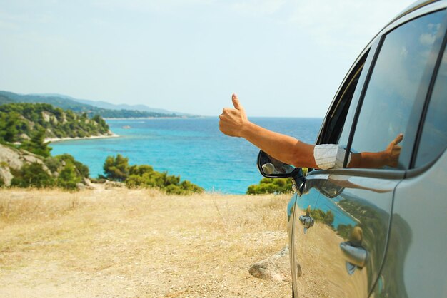 A happy guy in auto sea background