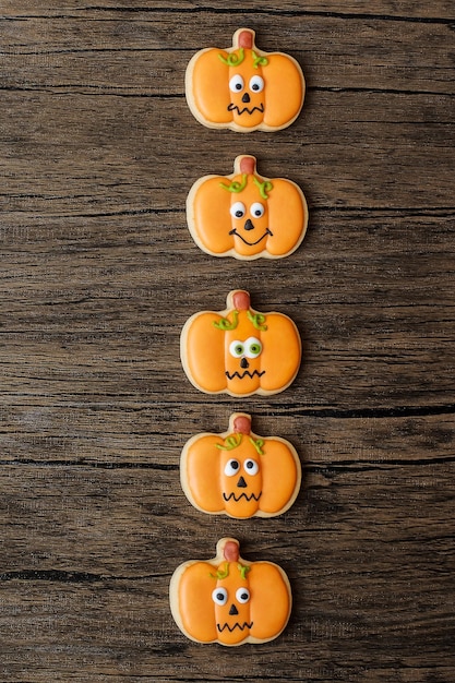 Happy Halloween day with funny Cookies set on wooden table background Trick or Threat Hello October fall autumn Festive party and holiday concept