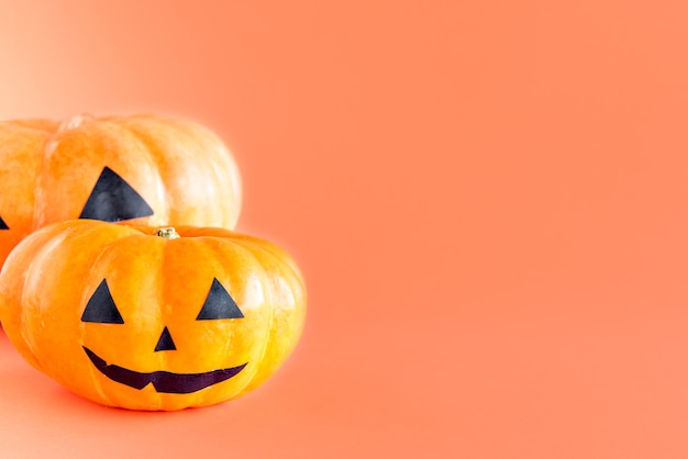 Happy Halloween decoration on orange background. Halloween Pumpkin.