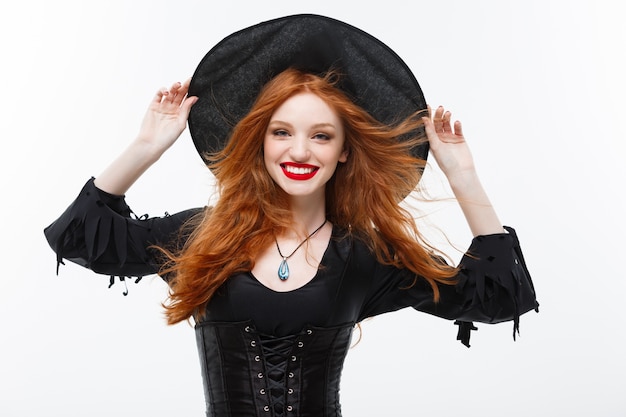 Happy Halloween ginger hair Witch. Isolated on white background.