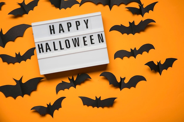 Happy Halloween lightbox message with black scary bats