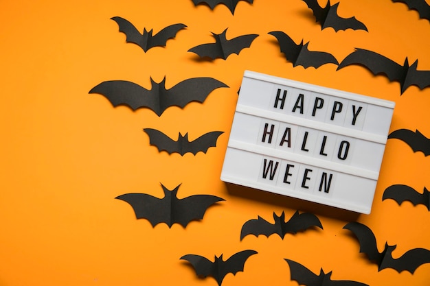 Happy Halloween lightbox message with black scary bats