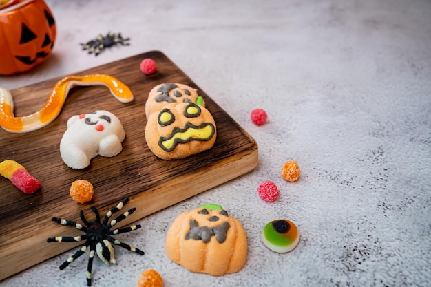 Happy Halloween with candy and pumpkin for party. trick or treat at in autumn season.