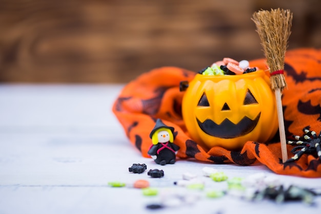 Happy Halloween with candy and pumpkin for party. trick or treat at in autumn season.
