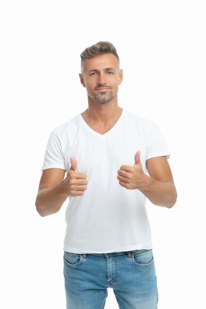 Happy handsome man smile showing approval sign hand gesture isolated on white, thumbs-ups.