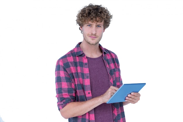 Happy handsome man using tablet computer 