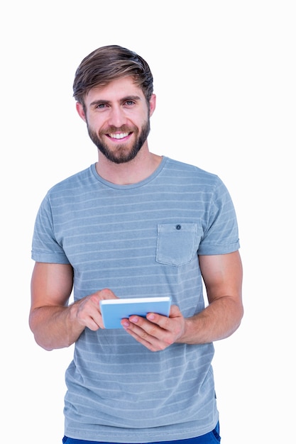 Happy handsome man using tablet computer 