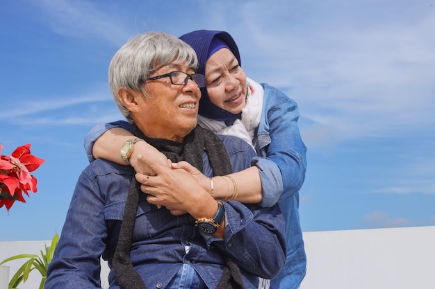 Happy and healthy mature couple under the blue sky Never ending love