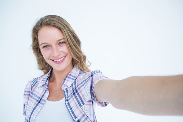 Happy hipster smiling at camera 