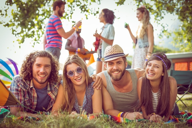 Happy hipsters smiling at camera