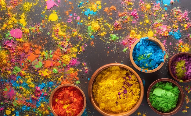 Happy Holi decoration, the indian festival. Top view of colorful holi powder  on dark background. Generative AI Stock Illustration