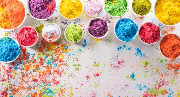 Happy Holi decoration the indian festivalTop view of colorful holi powder on white background