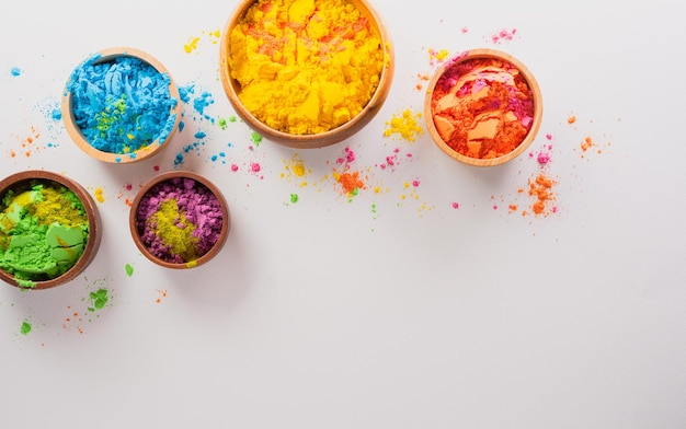 Happy Holi decoration the indian festivalTop view of colorful holi powder on white background