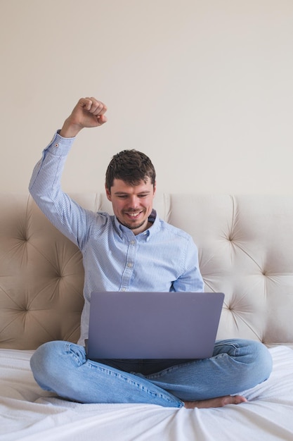 Happy home office developer with his dog