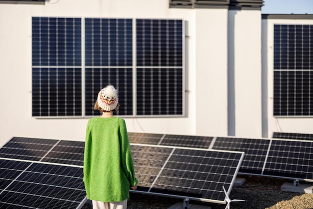 Happy house owner with a solar plant