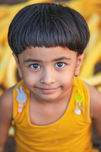 Premium Photo | Happy indian girl child playing at ground