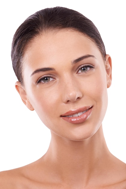 Happy and it shows Shes radiantly beautiful Cropped studio portrait of an attractive young brunette isolated on white