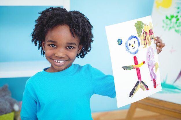 Photo happy kid enjoying arts and crafts painting