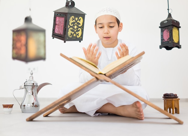 Happy kid with Ramadan lantern