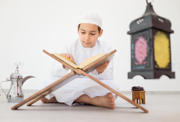 Happy kid with Ramadan lantern