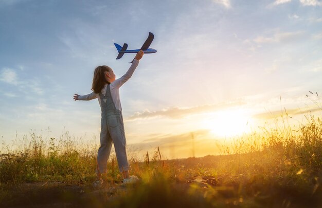 Happy kid with toy plane