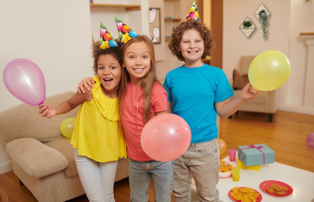 Happy kids celebrating bday and looking excited