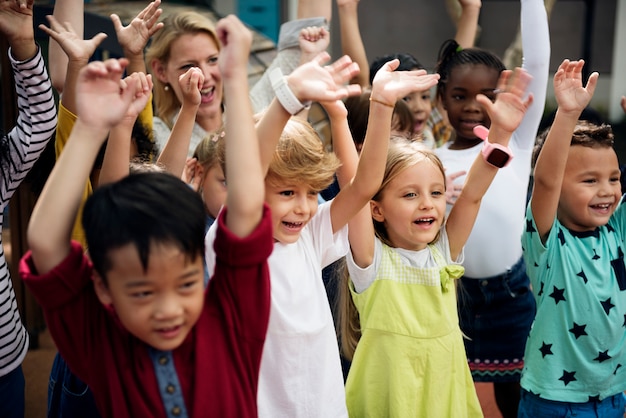 Photo happy kids at elementary school