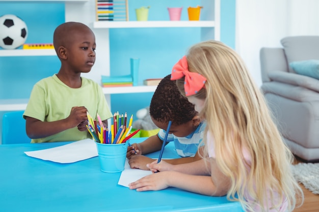 Happy kids enjoying arts and crafts together