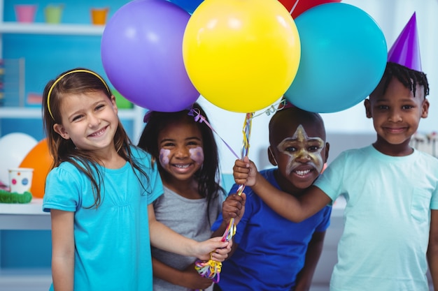 Happy kids with balloons