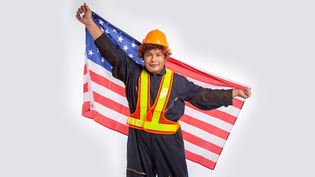 Foto felice festa del lavoro bandiera americana e uomo del lavoro bandiera usa bandiera americana festa del lavoro