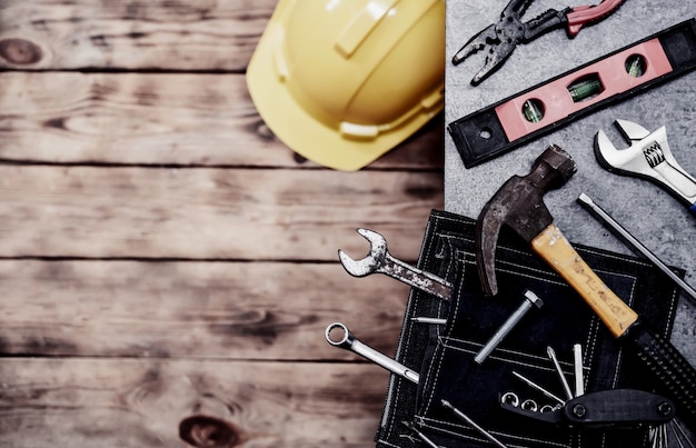 Photo happy labor day concept and background. engineer and worker tools. public holiday in america and usa.