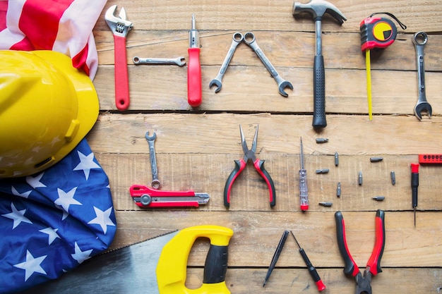 Happy Labor Day text with American flag on table