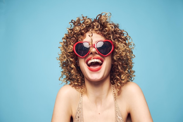 Happy lady expression of feelings cropped view fashion sunglasses and studio