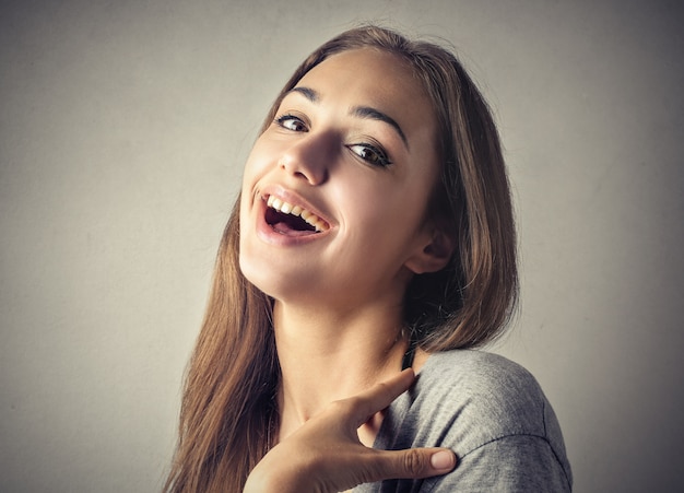 Happy laughing young woman