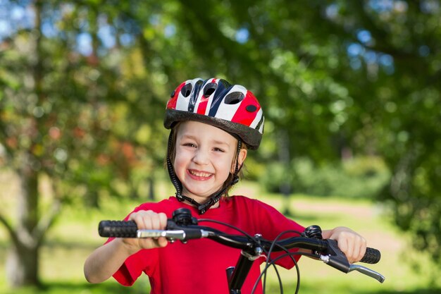 happy little boy on his bike 