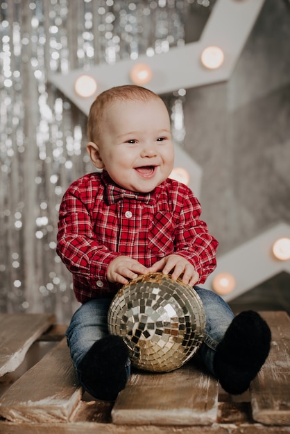 Happy little boy smiling  of Christmas decorations